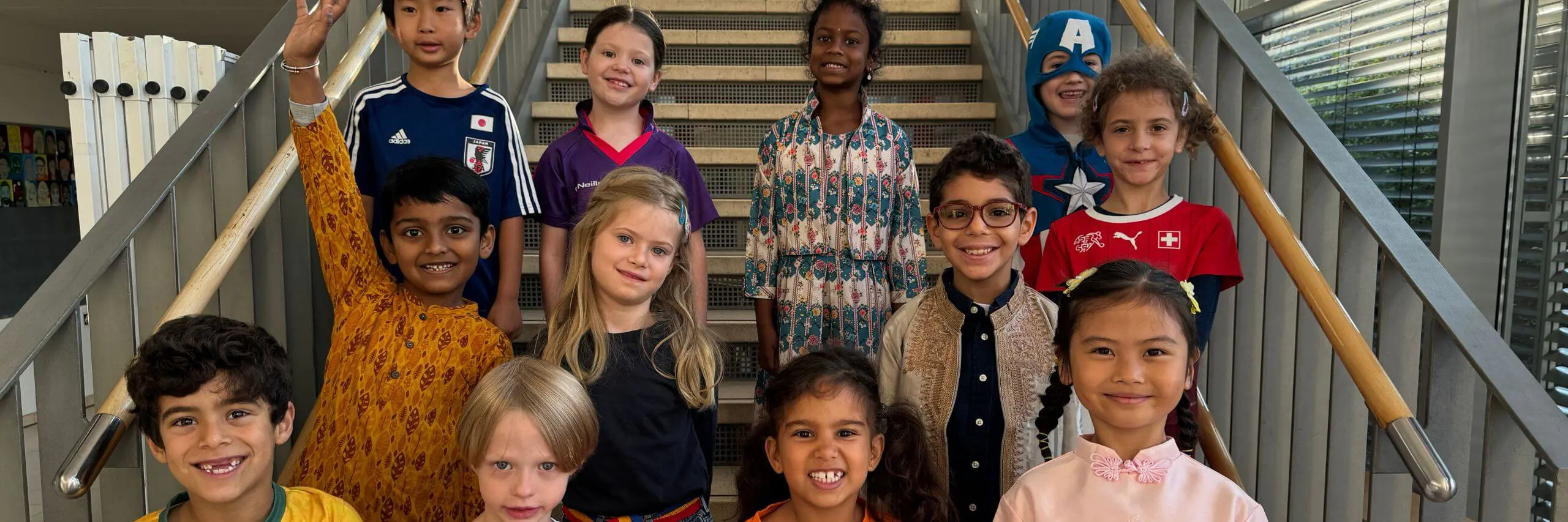 ISD Elementary School pupils on staircase.