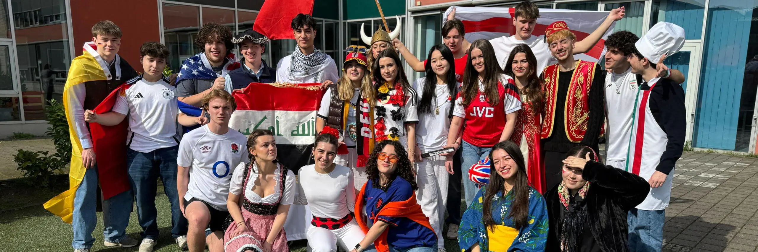 ISD Senior pupils with world flags.