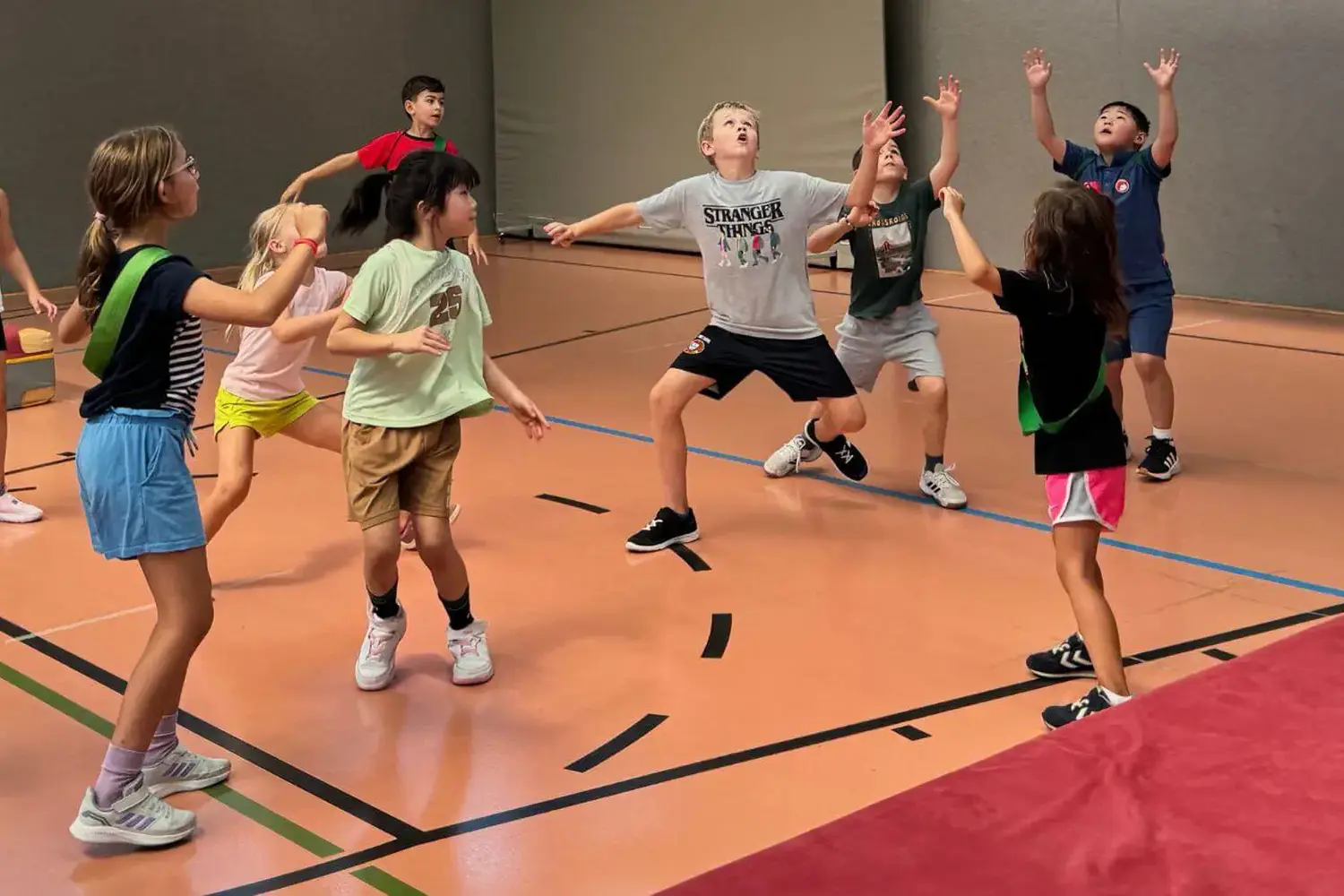 ISD pupils playing basketball.