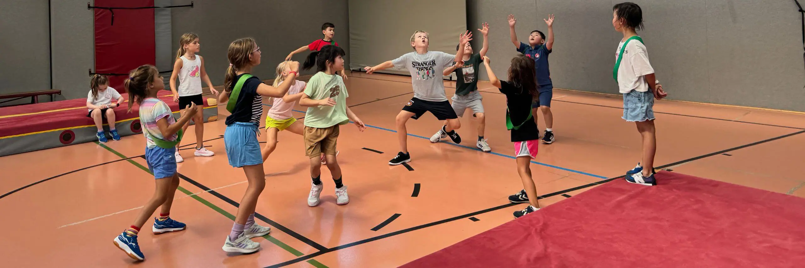 ISD pupils playing basketball.